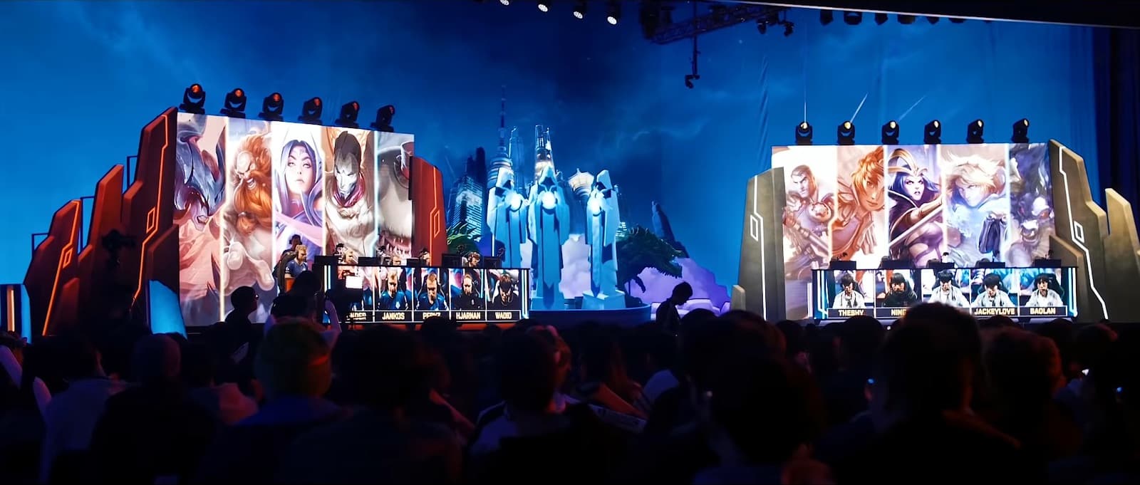Invictus Gaming on stage at the 2018 World Championship semifinal — TheShy's name lit up on the arena screen